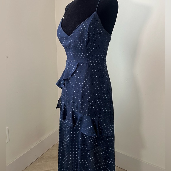 Perfect for the country club! This polka dot ruffled dress is all class. - Picture 2 of 5